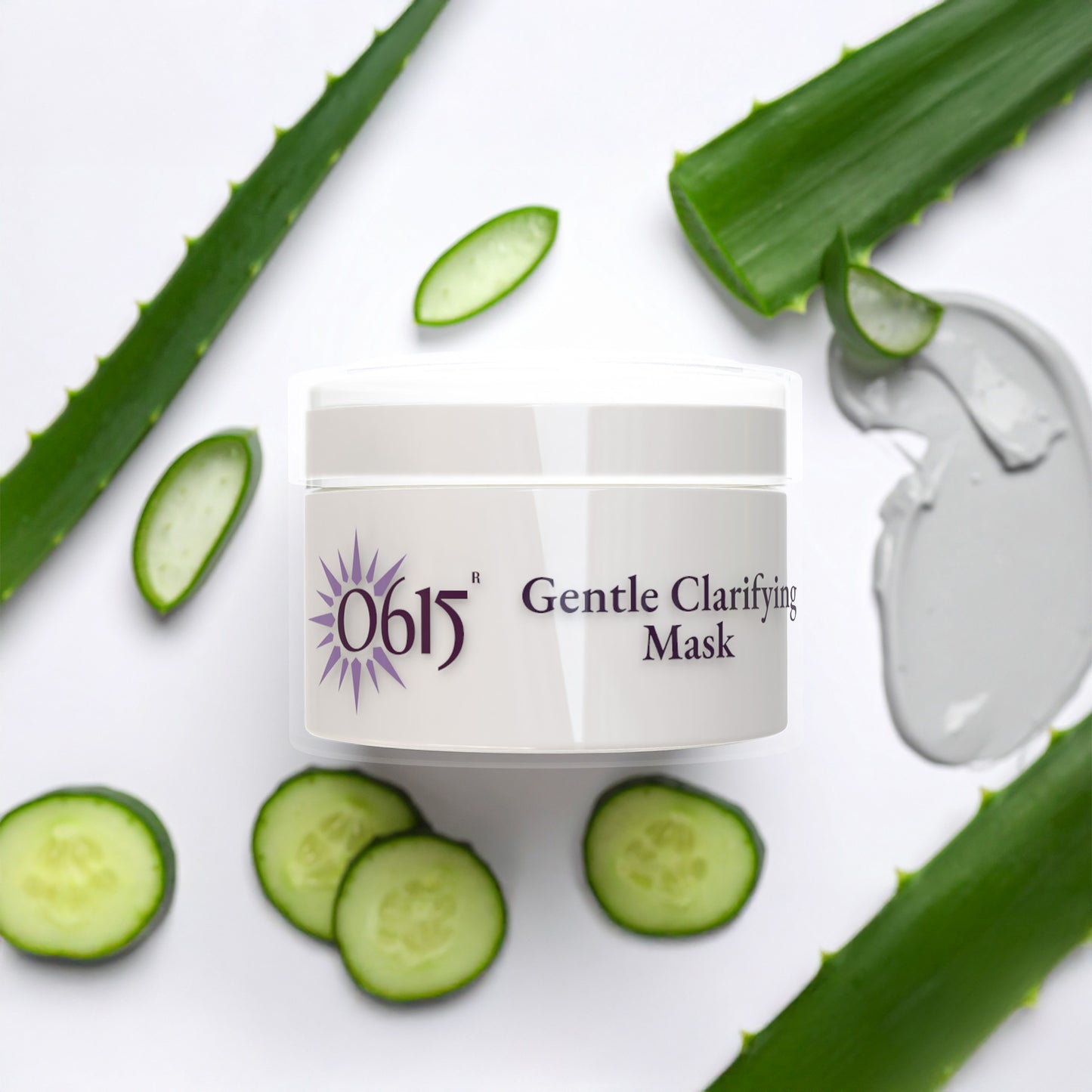 0615 Gentle Clarifying Mask jar with aloe vera leaves and cucumber slices on a white background