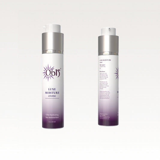 Two bottles of Luxe Moisture Creme on a white background