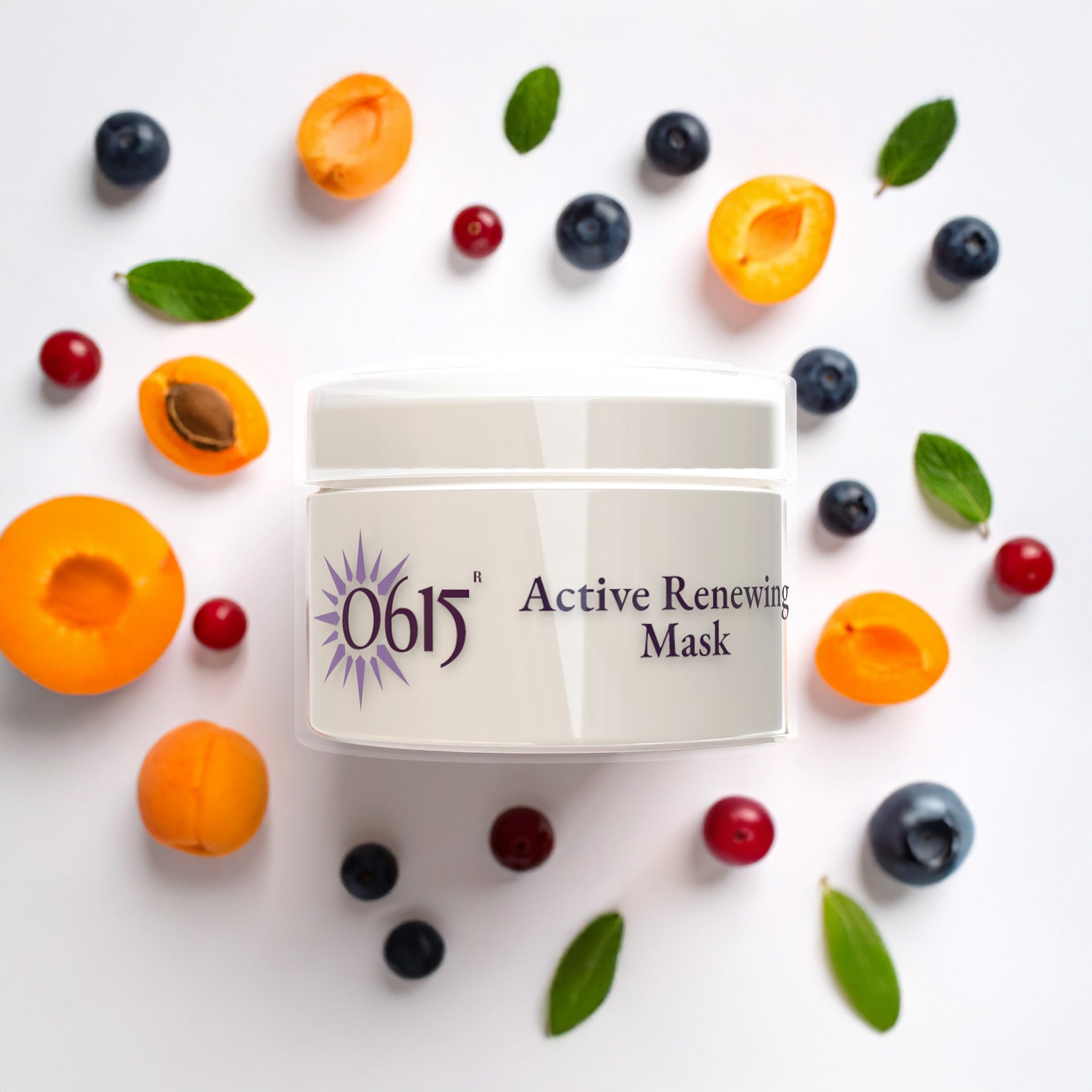 0615 Active Renewing Mask surrounded by fruits and leaves on a white background