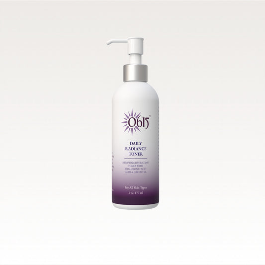 White bottle with purple label of a Daily Radiance Toner on a light gray background